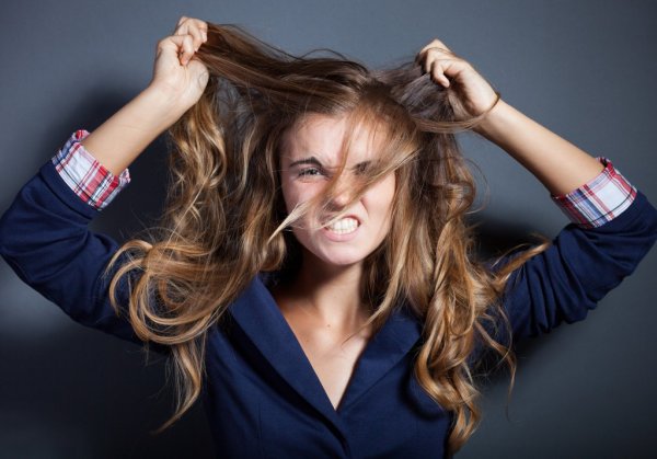 Depositphotos 31881575 Stock Photo Shouting Angry Girl Pulling Hair