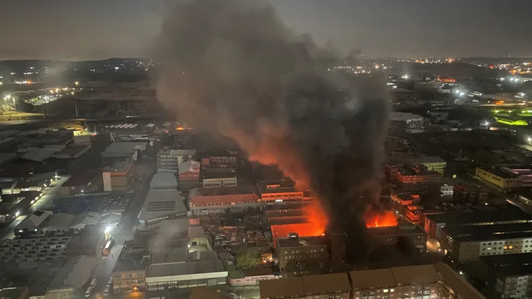 At least 73 dead after fire tears through building used as temporary housing in South Africa